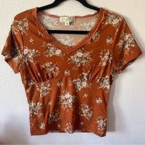Orange short sleeve floral shirt
